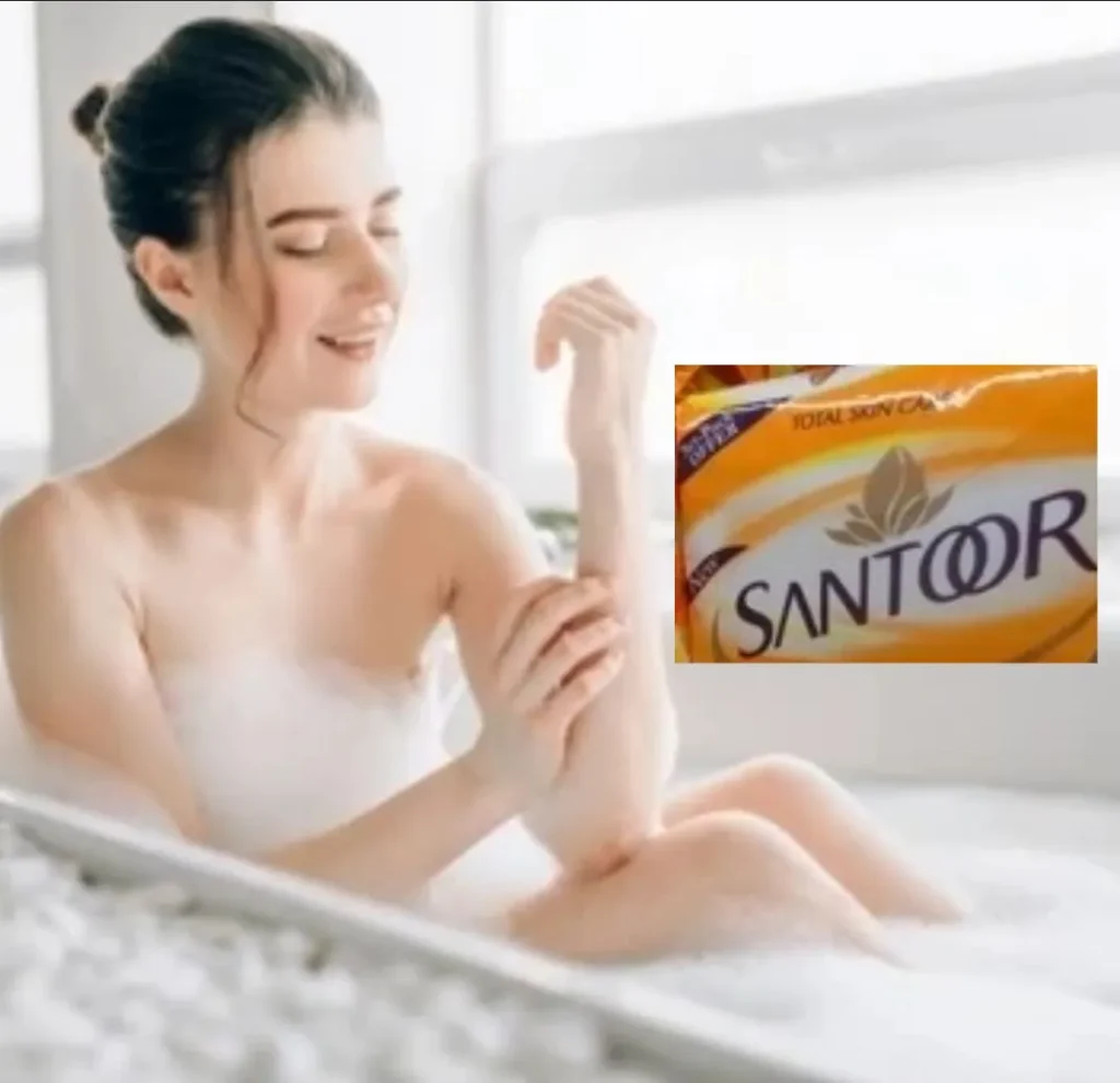 A woman showing Santoor Sabun effect