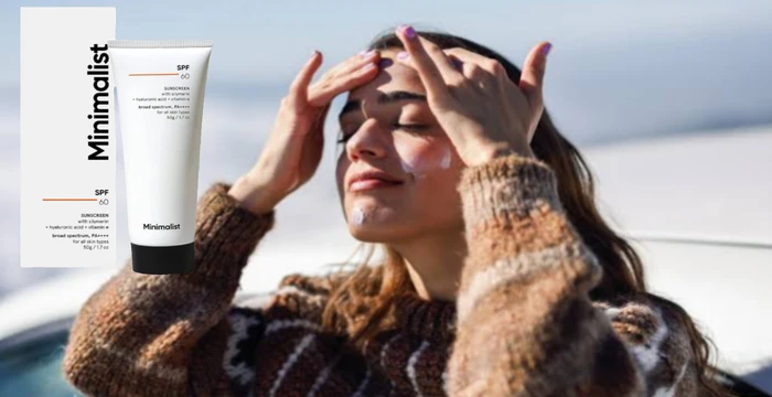 A Woman Applying Minimalist Sunscreen On Her Face