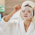 A girl put off Garnier face mask on her face