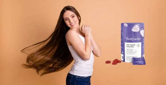 A beautiful girls showing the results of Bodywise Hair gummies on her hair